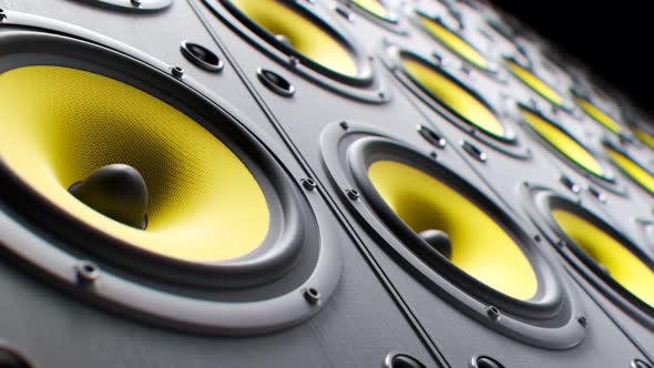 Playing yellow, modern speakers stacked in an endless loop. Membranes vibrate.