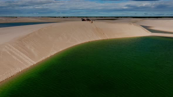 Drone Moves Away, Showing A Beautiful Lagoon Of Greenish Tones, A Paradise In Brazil.