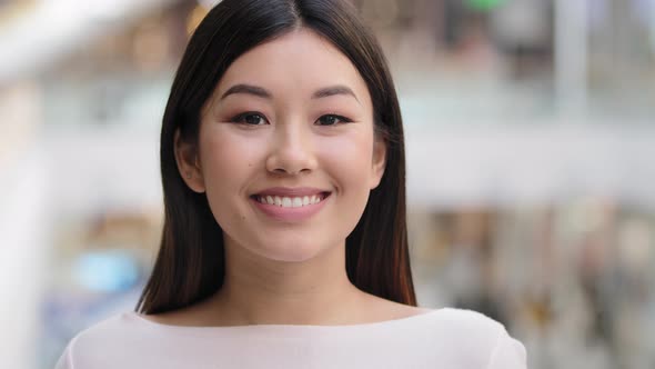 Asian Headshot Happy Optimistic Millennial Girl 20s Brunette Woman with Natural Makeup Businesswoman alt