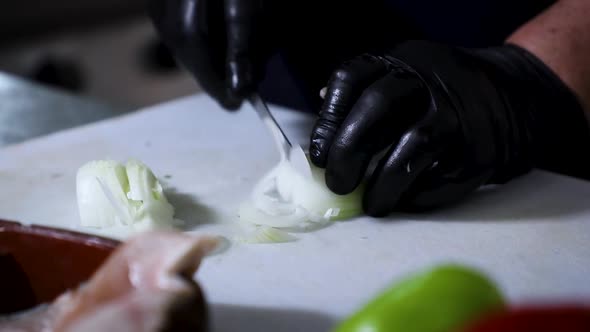 Slicing Onion in Kitchen