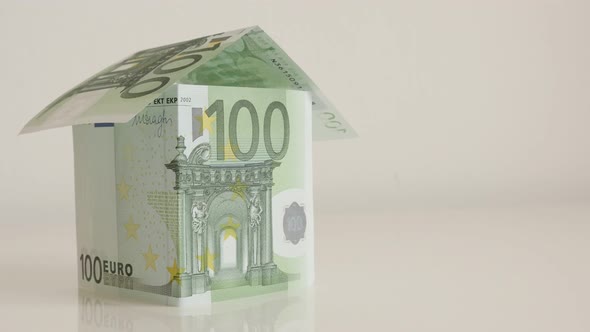 Realistic   hundread Euro banknotes house concept 4K 2160p 30fps UHD tilting footage - Slow tilt rea alt