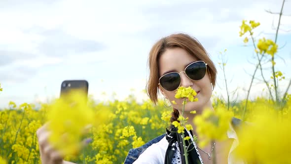 Sexy Girl in a Yellow Field with Rape alt