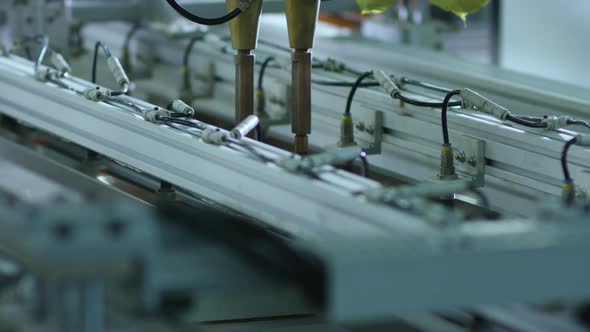 robotic line at a manufacturing facility alt