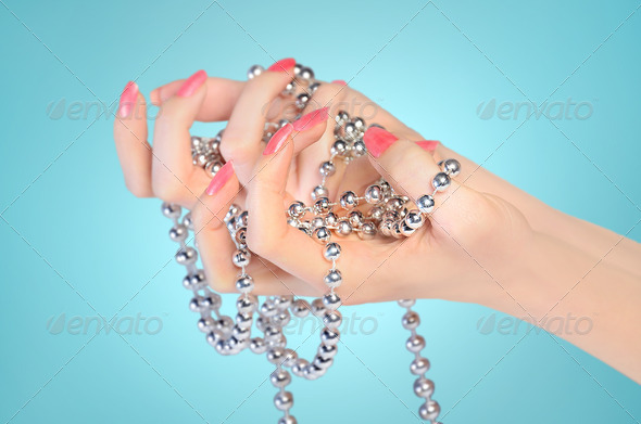 Hand with beads