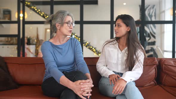 Young Woman Visiting Grandmother at Home Women Talk alt