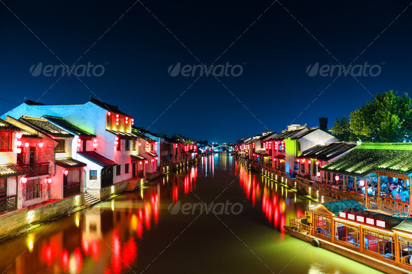 chinese ancient town with grand canal at night - Stock Photo - Images