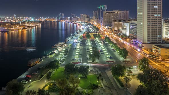 Dubai Creek Landscape Night Timelapse with Boats and Ship Near Waterfront alt