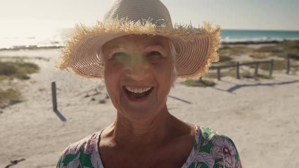 Senior woman smiling at the camera alt