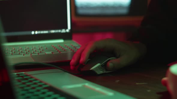 Professional Hacker Typing on Keyboard at Night Closeup of Man Hands Trying to Break Password Using alt