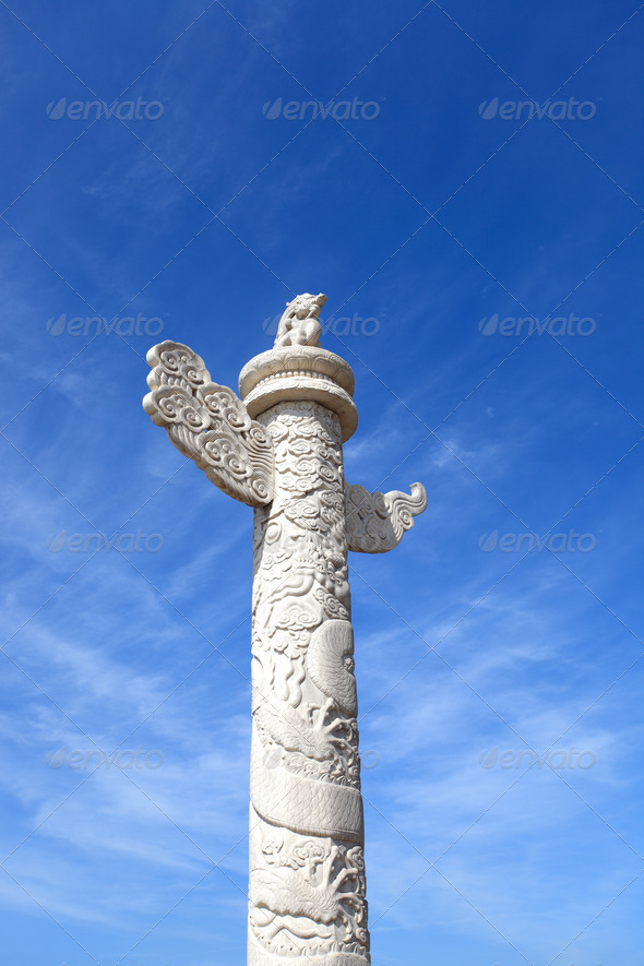 ornamental columns against a blue sky