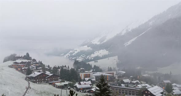 Sunset time lapse of valley view at Kleinwalsertal austria with snow wintertime alt