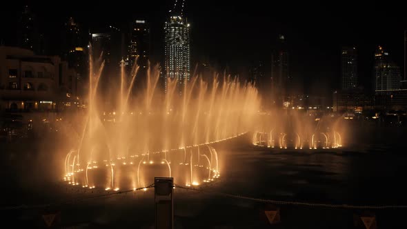 Dancing Fountain with Lighting in the City at Night alt
