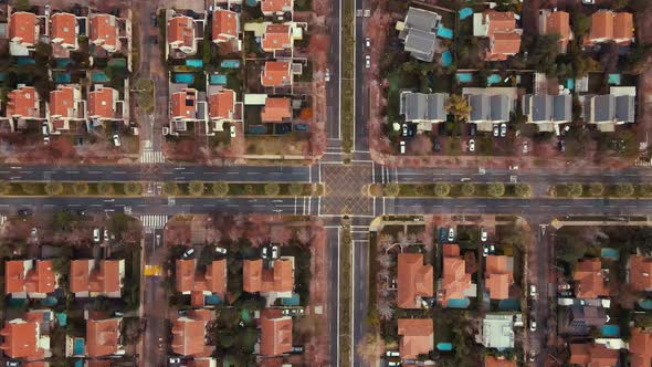 satellite view ascending over intersection on the suburbs in the middle of the quarantine-4K alt