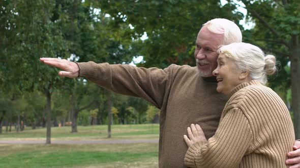 Happy Mature Couple Smiling Remembering Past, Pleasure Moments Together, Slow-Mo