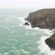 Aerial pass along the Cornwall coastline where the National Trust keeps the tin mine buildings open - VideoHive Item for Sale