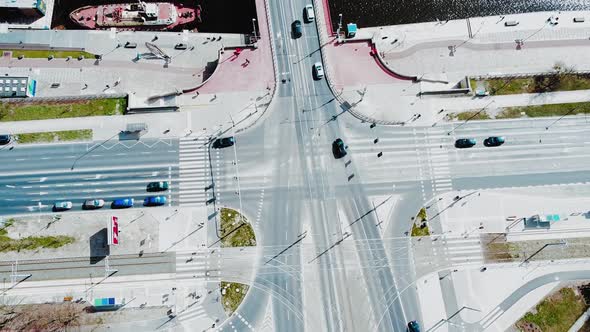 Road in the city. Crossroads from above. City traffic. Cars are moving.