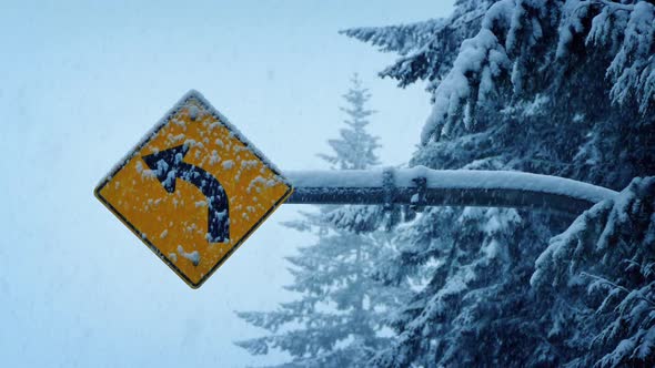 Road Sign In Heavy Snowfall alt