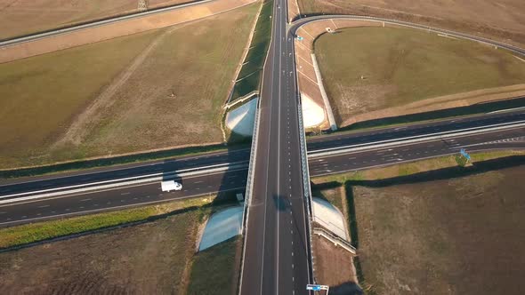 Top View of Road and Bridge with Moving Cars alt