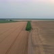 Aerial View Of Agricultural Land With Harvester - VideoHive Item for Sale