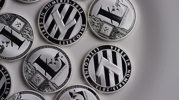Rotating shot of Litecoin Bitcoins (digital cryptocurrency) - BITCOIN LITECOIN 0129 alt