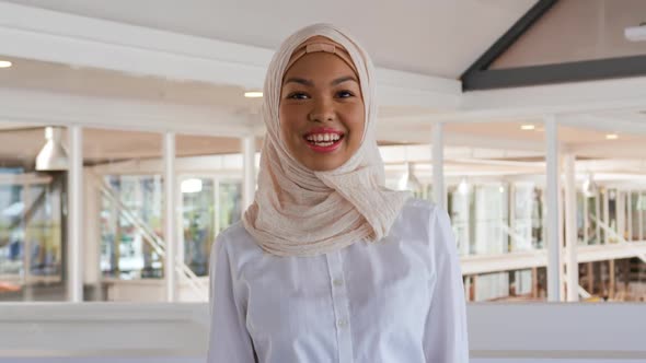 Portrait of a young woman at a business conference alt