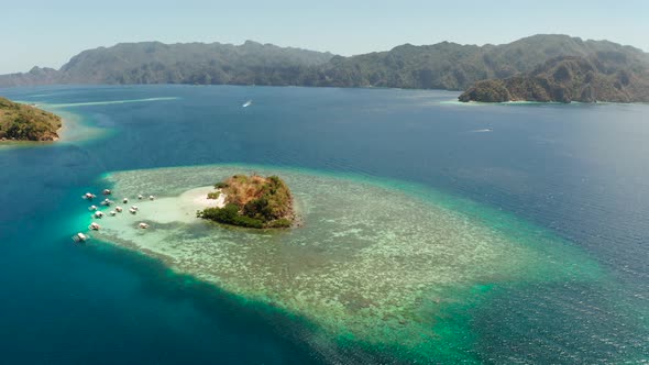 Small Torpical Island with White Sandy Beach Top View alt