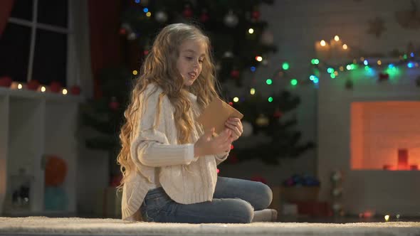 Nice Girl Hugging Envelope, Dreaming About Christmas Presents, Belief in Miracle alt