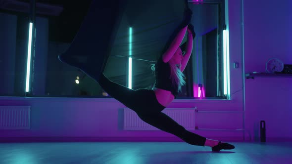 Beautiful Young Woman is Doing Physical Exercise in Hammock for Flyyoga Antigravity Yoga alt