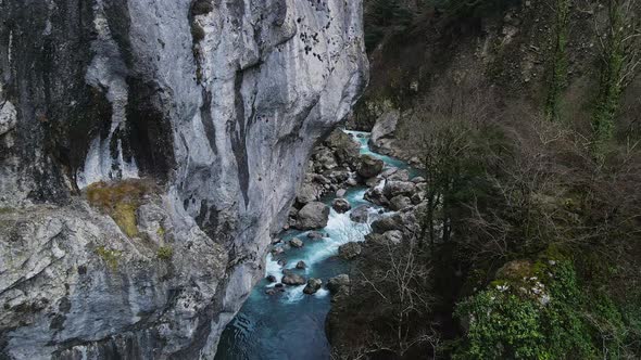 Abandoned Old Dangerous Road in a Narrow Gorge Along the Mzymta River alt