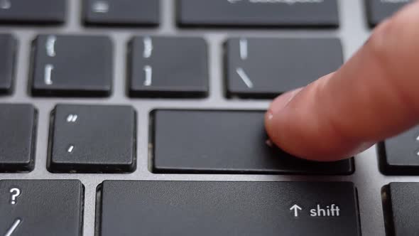 Enter Button Long Pressing a Lot of Times on Keyboard Laptop Keyboard Close Up alt