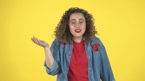 Girl Listens Carefully, Waving Her Hands in Indignation, Shrugs, Then Agrees and Laughs, Slow Motion alt