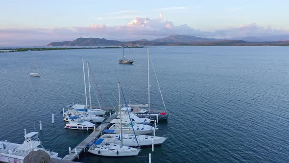 Aerial shot of boats moored at Bahia de las Calderas harbor, Dominican Republic alt