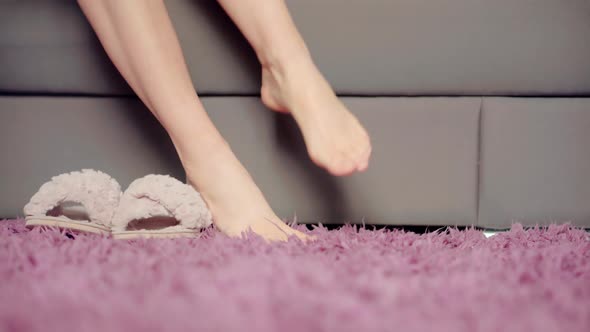 Girl Waking Up Legs Feet In Bedroom. Comfort Cozy Morning. Awake Bedtime Early Morning. alt