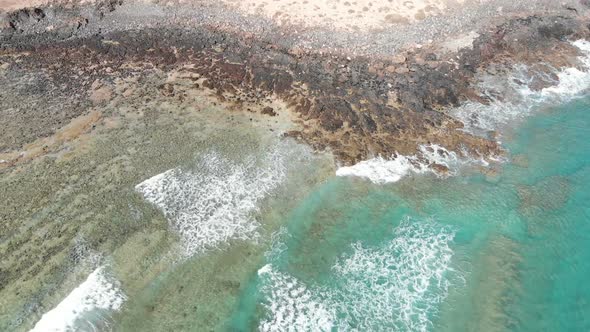 Drone flying over the sea of  Lobos Island -Fuerteventura - Canary Islands alt
