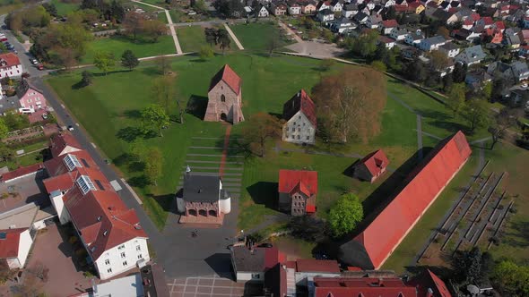 Beautiful flight over the monastery in the city of Lorsch. alt