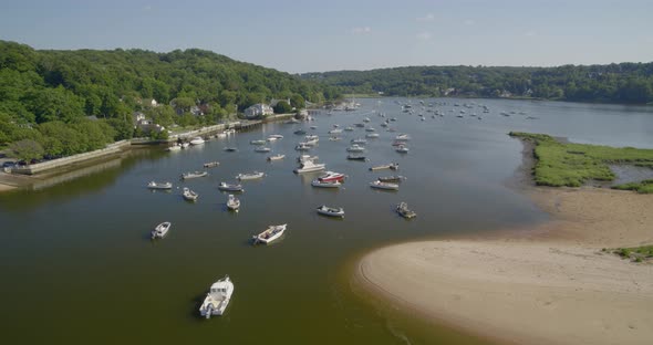 Forward Aerial Pan of Boats Anchored on Cold Spring Harbor alt