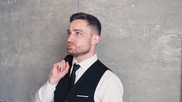 Smiling Young Business Man Caucasian Ethnicity with a Beard Middleaged In  Classic Black Suit Shirt alt