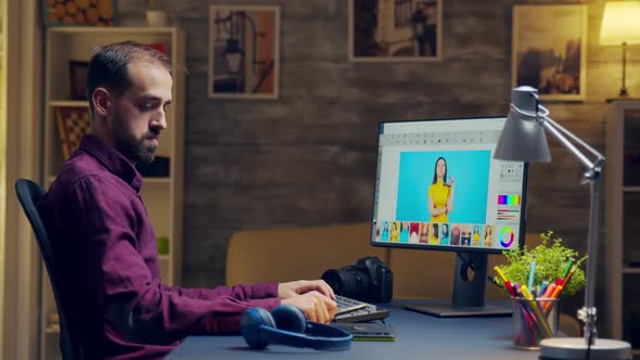 Photographer Putting Headphones and Listening Music alt