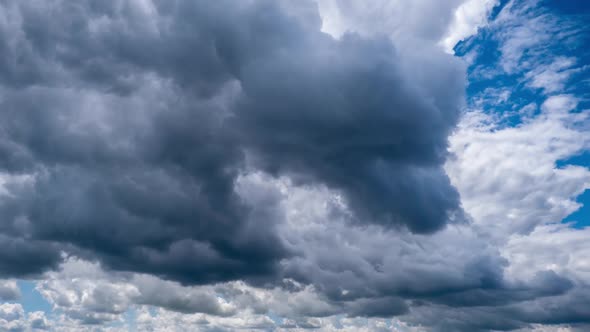 Timelapse of Dramatic Storm Clouds Moving in the Sky alt