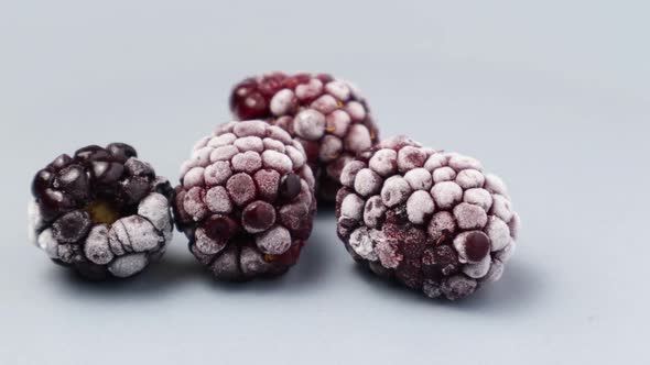 Frozen Blackberry is Quickly Defrosted on the Plate