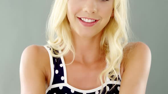 Beautiful woman holding cherry alt