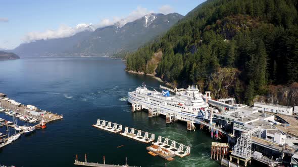Horseshoe Bay Marina And Ferry Terminal At Daytime In Howe Sound, West Vancouver, Canada. - aerial alt