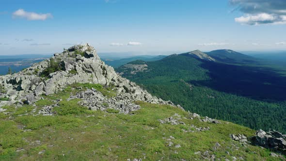 Aerial View of Suka Mountain Range in Ural, Drone Flies Near Stones and Boulders