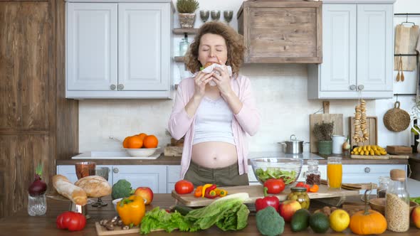 Beautiful Pregnant Woman Eating Burger alt