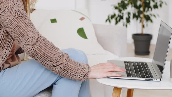 Cropped Shot Unrecognizable Woman Typing on Laptop Sitting at Home on Couch Works Online Holding alt