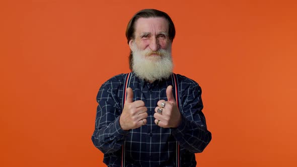 Mature Old Bearded Grandfather Showing Thumbs Up and Nodding in Approval Successful Good Work alt