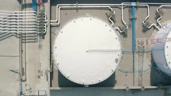 Quadrocopter take-off from the roof of a huge oil storage alt