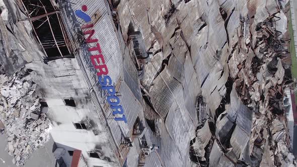 Vertical Video of the Consequences of the War in Ukraine  a Bombedout Shopping Center in Bucha alt