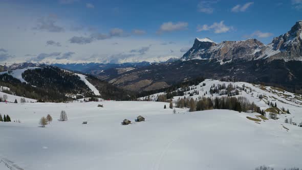 Aerial, Winter Landscape In Dolomites Mountains On A Sunny Day In Italy