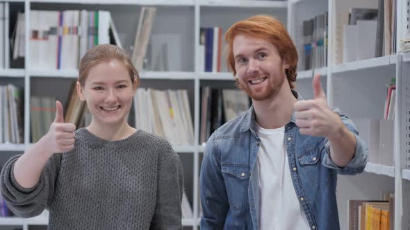 Thumbs Up By Couple Man and Woman Office Portrait alt